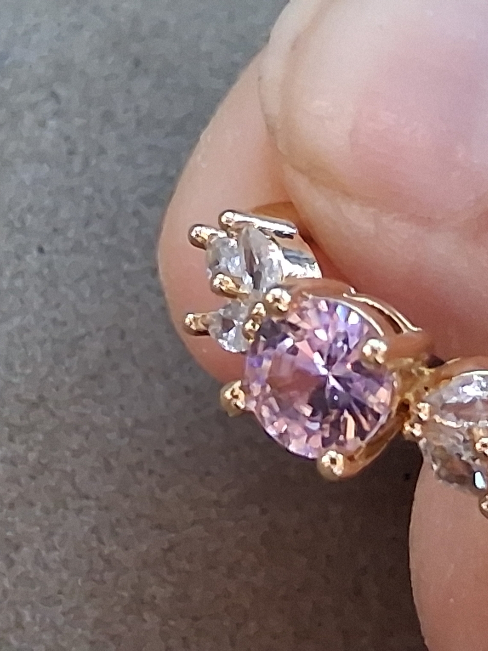 Gold Ring with Pink Round Center Stone and Clear Accents